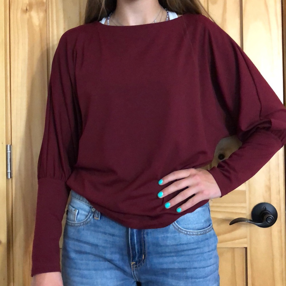 Long sleeve cranberry shirt.